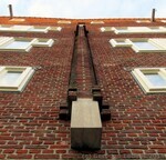 Gevel Afrikanerplein met de kenmerkende Roodenbugh-versiering.
<br/>
Gert-Jan Lobbes, 2015